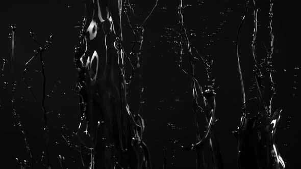 Super Slow Motion Shot of Black Glossy Paint Splash at 1000 Fps