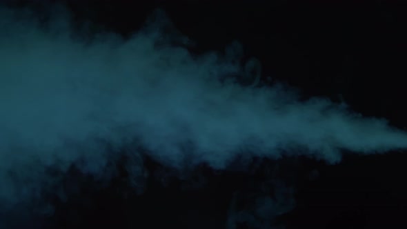 Smoke texture over blank black background. Mystical steam at night.