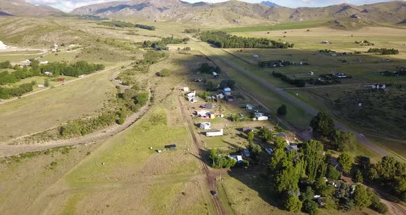 Small Quiet Village By The Mountains In Buenos Aires, Argentina - aerial shot