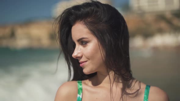 Portrait Cute Happily Smilling Girl Standing on the Background of the Sea