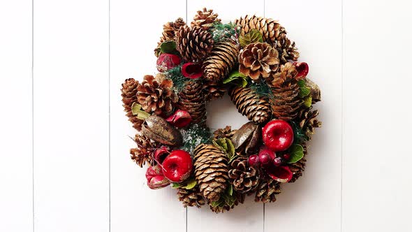 Christmas Wreath on White Wooden Background