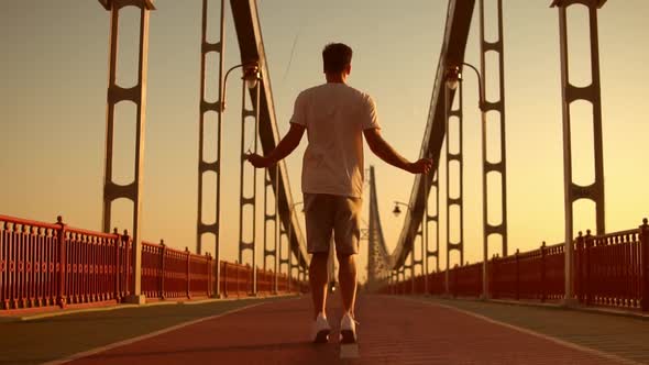 Back View of a Man Jumping