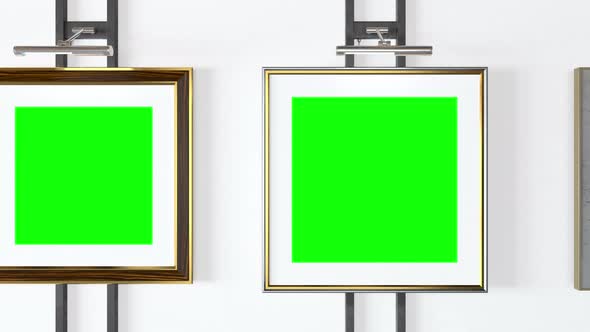 Empty picture frames with track green screen and a spotlight lamps - Seamlessly looping 