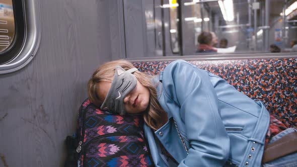 Slow Motion Young Beautiful Girl in the Blindfold on the Eyes, Fell Asleep on the Subway Train