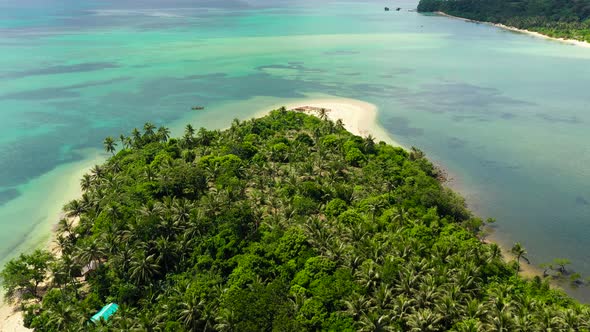 Tropical Island with a Lagoon and White Sandy Beach. Caramoan Islands, Philippines.