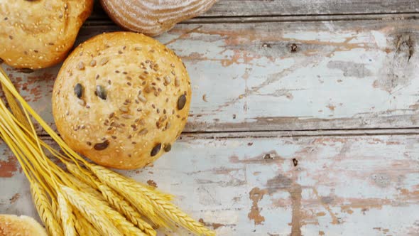 Various types of breads with wheat grains