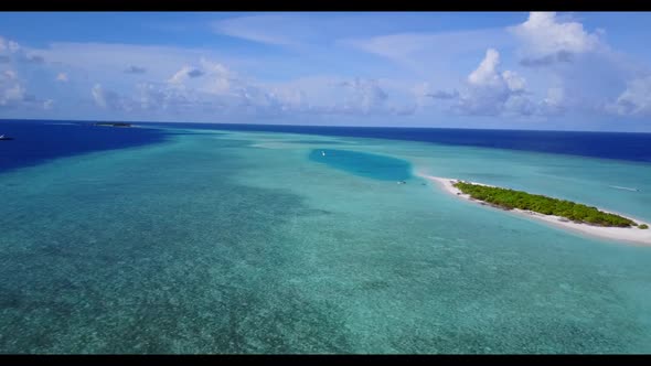 Aerial view seascape of marine tourist beach vacation by turquoise ocean and white sand background o