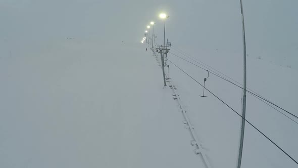 Aerial Shot of Ski Lift and Lampposts