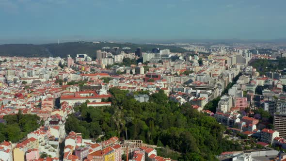 Aerial of downtown Lisbon and its lush landscape