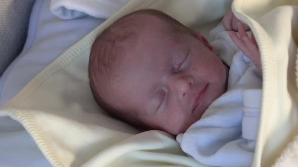 Cute baby sleeping and smiling. Sleeping baby concept.