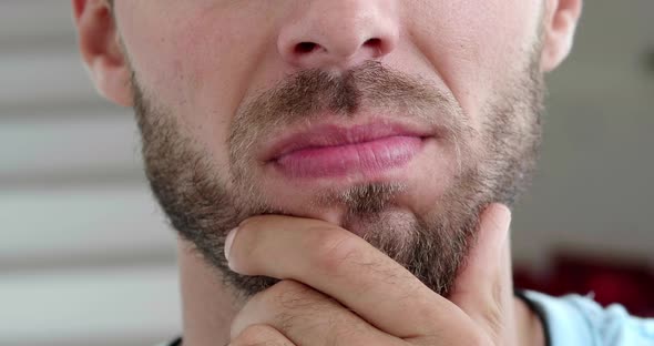 Pensive Confused Guy Leaning Hand Rubbing Beard While Thinking Over Difficult Choice