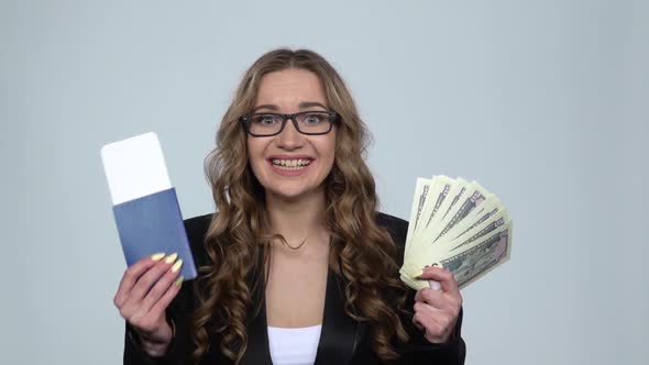 Girl Is Holding Passport, Plane Ticket and Money Very Rejoicing and Enjoying, Slow Motion