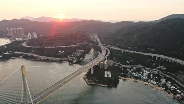 Sunset aerial over Ting Kau Bridge, amazing Hong Kong infrastructure