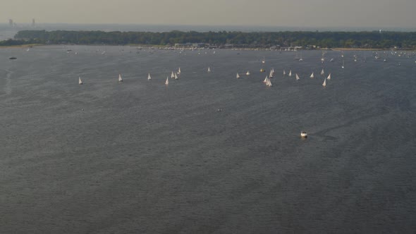 Slow Aerial Tilt Up of Sail Boats on Manhasset Bay Long Island