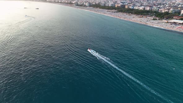Luxury boat sails to the port aerial view 4 K Turkey Alanya