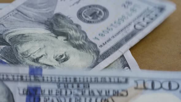 Rotating stock footage shot of $100 bills - MONEY 0134