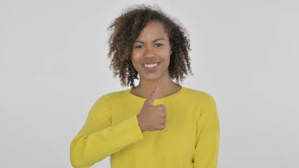 Young African Woman Showing Thumbs Up Sign on White Background