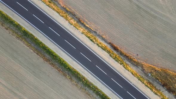 Aerial View of Cargo Truck Driving on Highway Hauling Goods