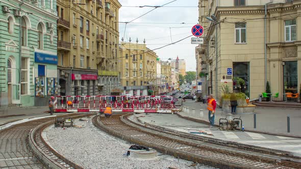 Workers with Protective Mask Welding Reinforcement for Tram Tracks in the City Timelapse