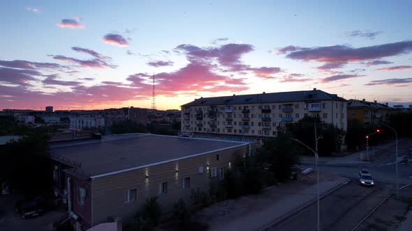 Pink Sunset Over a Small Town