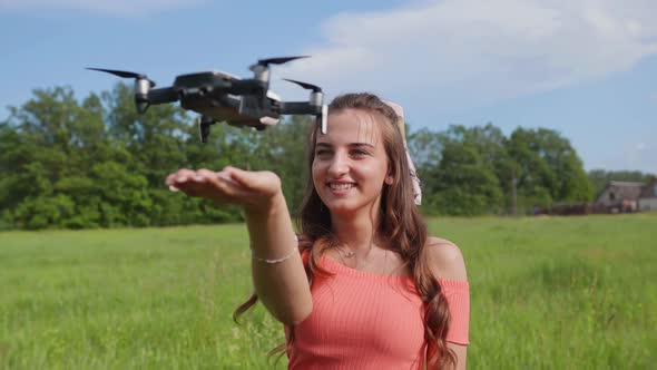 Beautiful Girl Catches a Drone in Her Palm