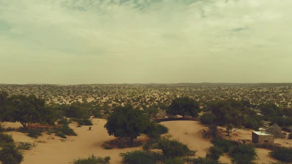 Aerial View Of Desert Landscape Of Tharparkar. Pedestal Up