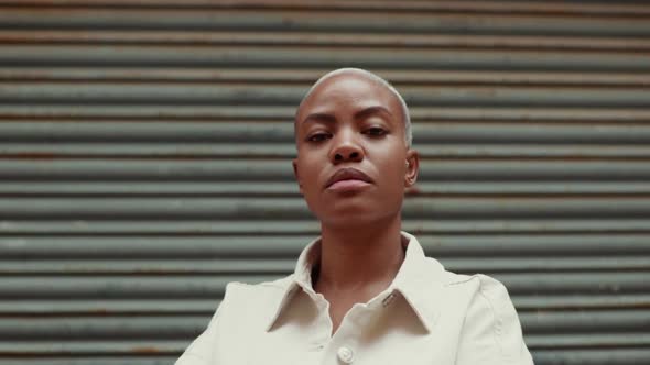 Slow motion shot of proud woman wearing denim jacket