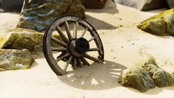 Old Tradition Waggon Wheel on the Sand