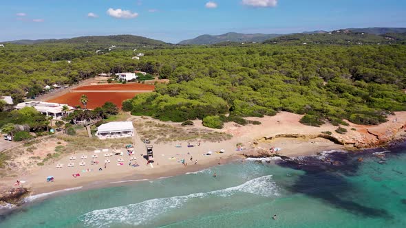 Aerial footage of the beautiful town of Ibiza in Spain showing the beach front