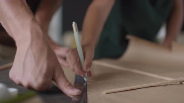 Drawing Paper Kite Outline During DIY