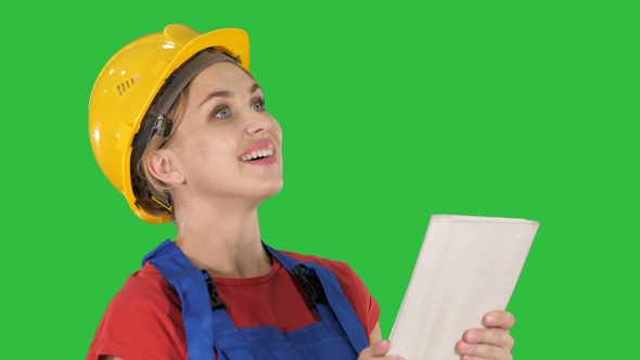 Female construction engineer with a tablet computer