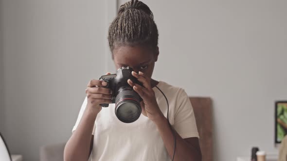Black Female Photographer Taking Food Pictures