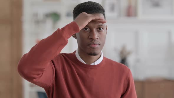 Portrait of African Businessman Looking Around, Searching