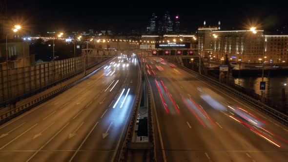 Timelapse.Night City Traffic on the Highway. Speed Limit Signs