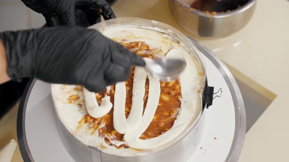 Pastry Chef Smears Vanilla Cream Over Caramel with Peanuts