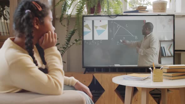 Little Black Schoolgirl Studying Online from Home