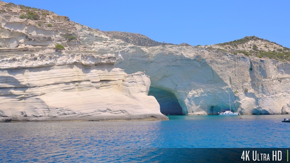 4K Tracking White Rocky Cliff Formations of Kleftiko, Milos Island, Greece