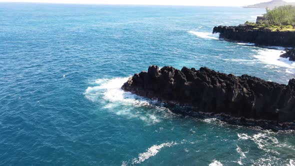 Drone footage of waves and rocks at the Cap Mechant on the Reunion island.