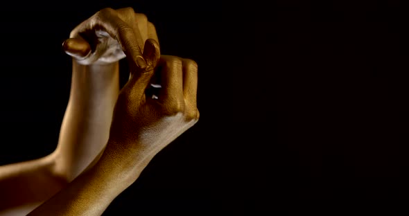 Golden Female Palms in Black Background, Greasepaint on Body Part