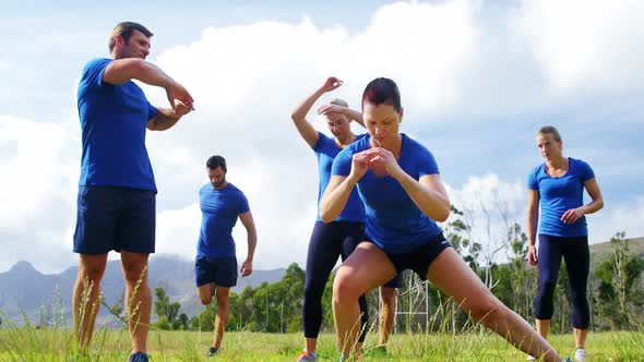 Fit people exercising in boot camp 4k