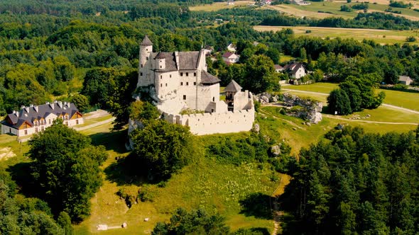 Morning aerial view on the medieval royal castle Bobolice. Poland. High quality 4k footage