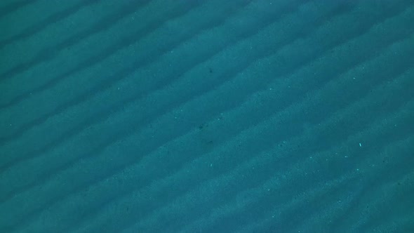 Texture of the sea and azure beach aerial view 4 K