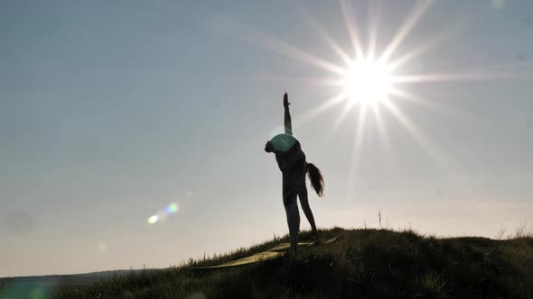 Woman Practicing Yoga