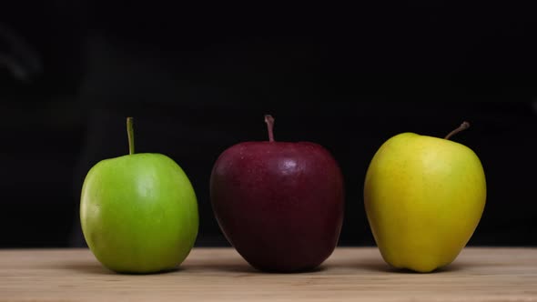 Three apples - yellow green red