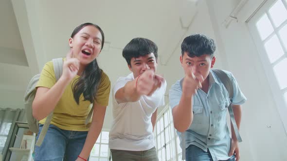 Asian Students At High School Bullying At The Camera