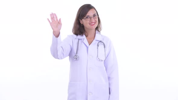 Happy Beautiful Woman Doctor Waving Hand