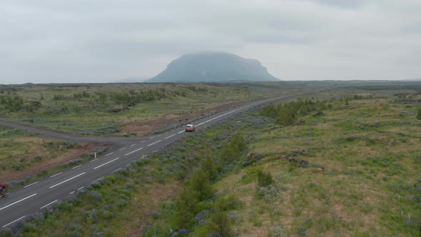 Birds Eye View Car Peacefully Driving on Ring Road the Most Important Highway in Iceland