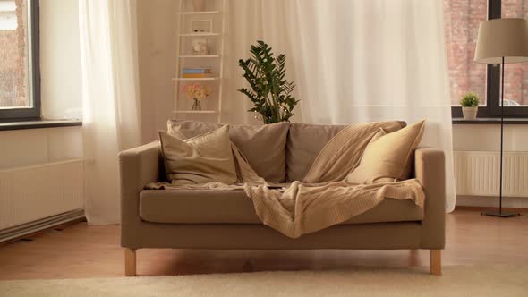 Sofa with Cushions at Cozy Home Living Room 4