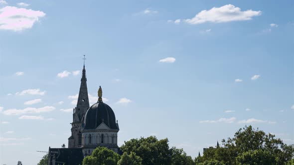 Clouds above church Notre Dame