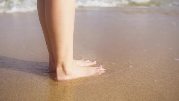 Close Up Woman Standing in Ocean Waves on Beach Scenic Summer Background